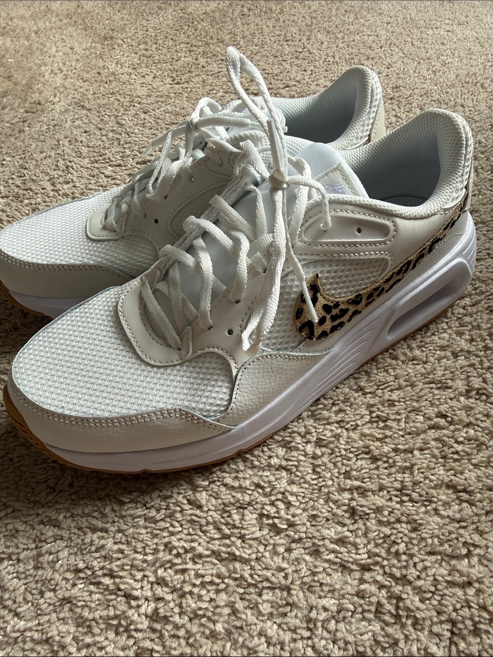 Nike Women's White Athletic Sneakers with Leopard Swoosh